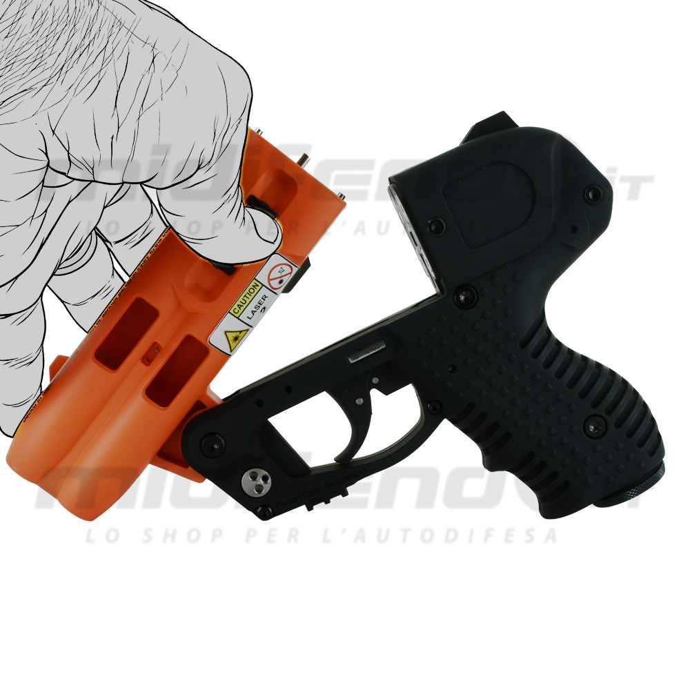 JPX4 Compact Laser vista laterale 3/4 con cartuccia arancione rimovibile tenuta in mano e corpo pistola nero gommato con laser